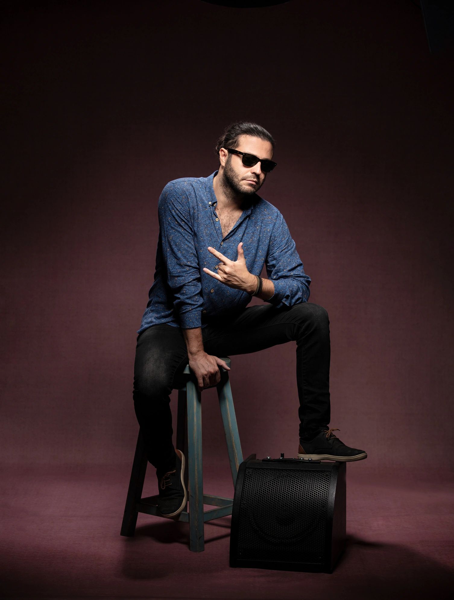 Young man posing in studio
