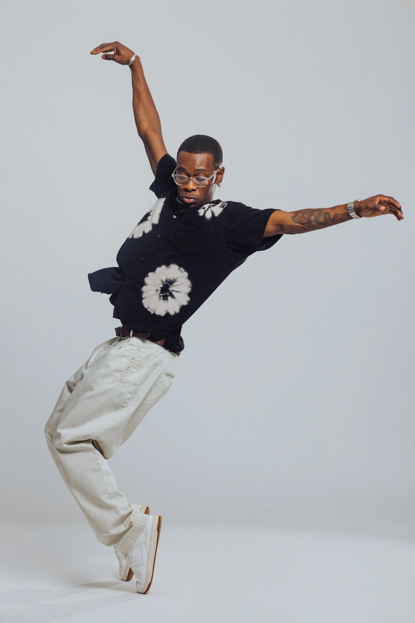Studio portrait with energetic performance pose