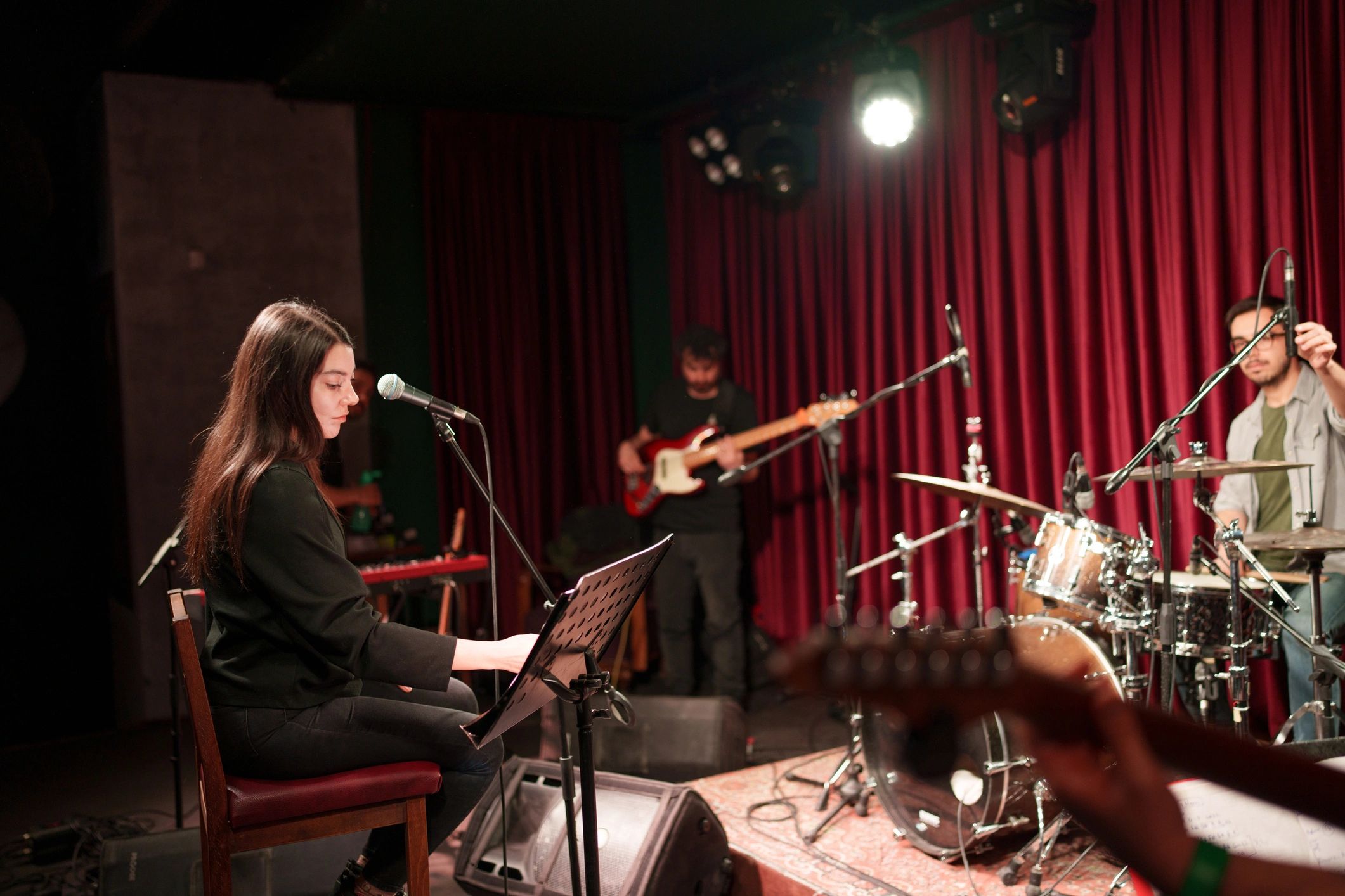 Band rehearsing together on stage